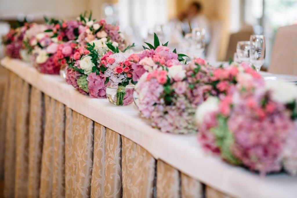 round-bouquets-pastel-pink-green-flowers-stand-long-di_1304-4695